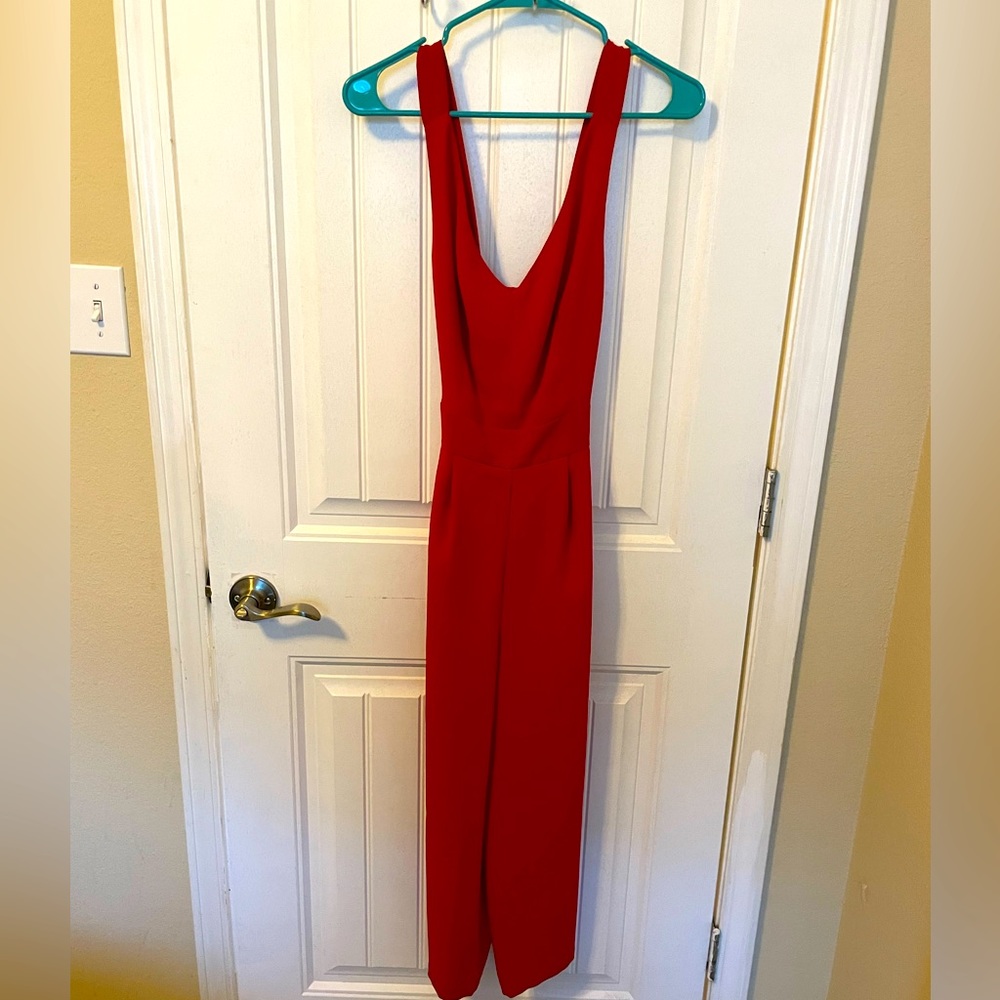 Red pantsuit with adjustable straps. Size 2.